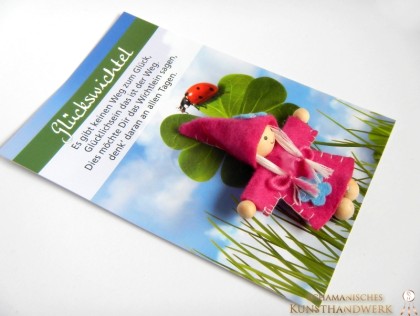 Glückswichtel in Pink auf Karte (Abb. ähnlich)